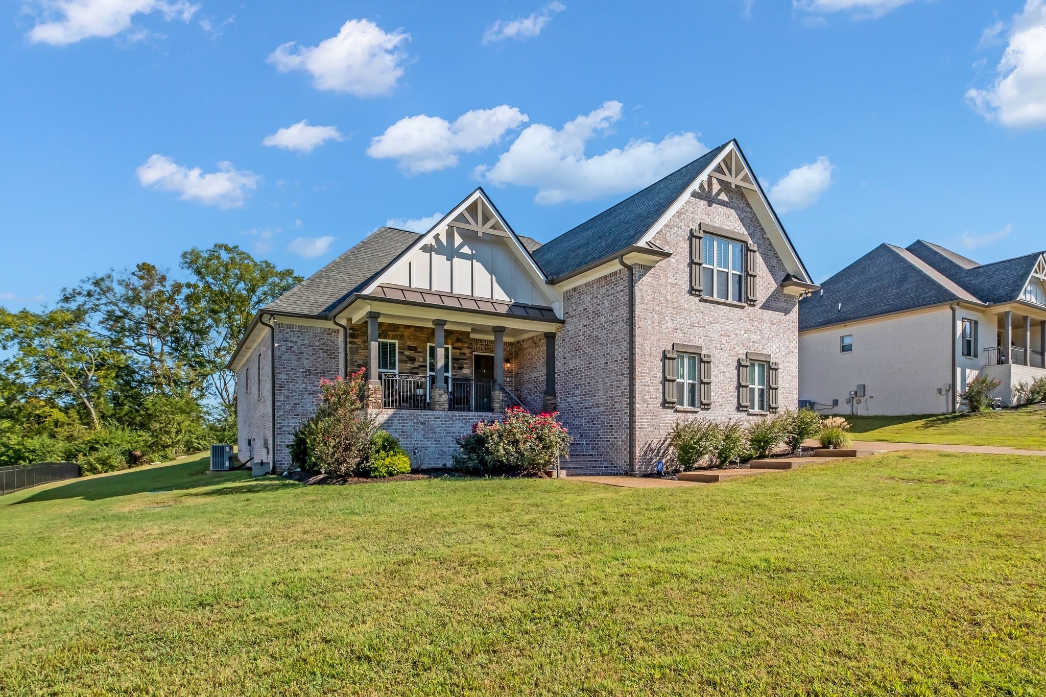 807 Ridgestone Place Lebanon, TN 37087 - Photo 3 of 34 a front view of a house with garden