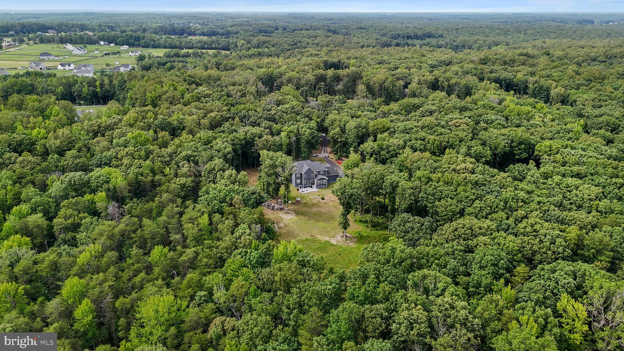 80 Shackelford Well Road Fredericksburg, VA 22406 - Photo 97 of 108 an aerial view of residential houses with outdoor space and trees