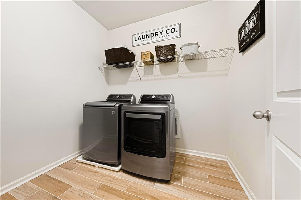 281 Greystone Court Winder, GA 30680 - Photo 42 of 71 a utility room with dryer and washer
