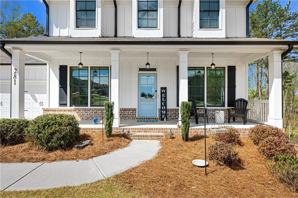 281 Greystone Court Winder, GA 30680 - Photo 5 of 71 a view of a building with potted plants