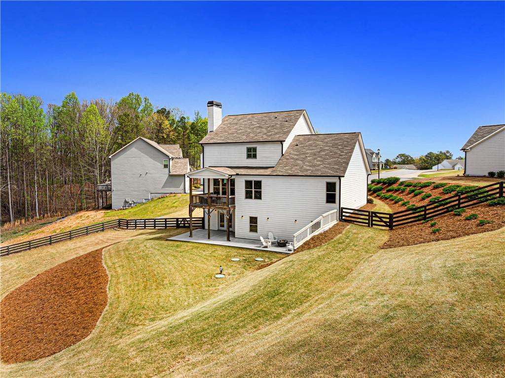 281 Greystone Court Winder, GA 30680 - Photo 52 of 71 a view of a house with swimming pool