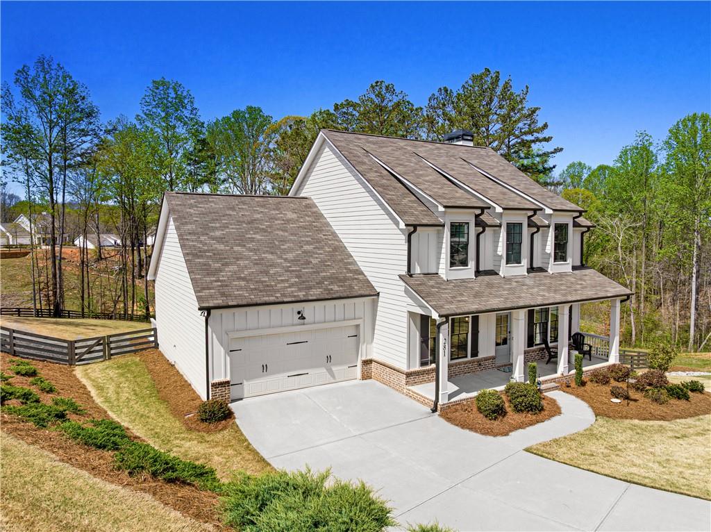281 Greystone Court Winder, GA 30680 - Photo 62 of 71 a aerial view of a house with swimming pool