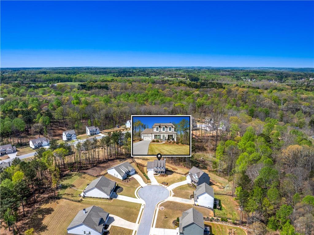281 Greystone Court Winder, GA 30680 - Photo 66 of 71 a view of a city with an ocean view