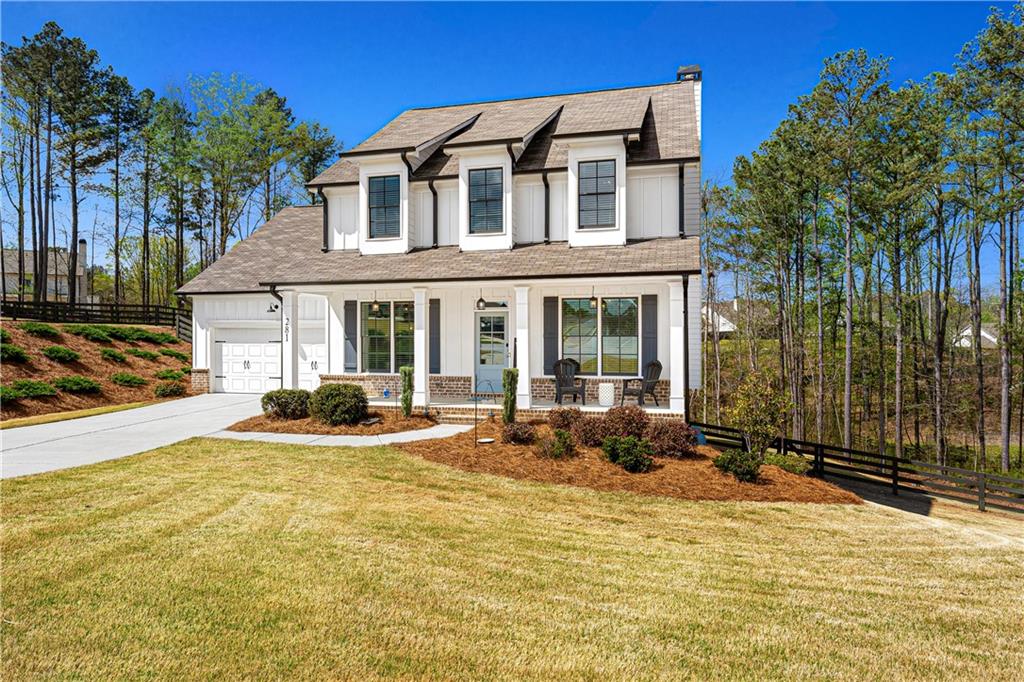 281 Greystone Court Winder, GA 30680 - Photo 67 of 71 a view of a house with backyard outdoor seating area and furniture