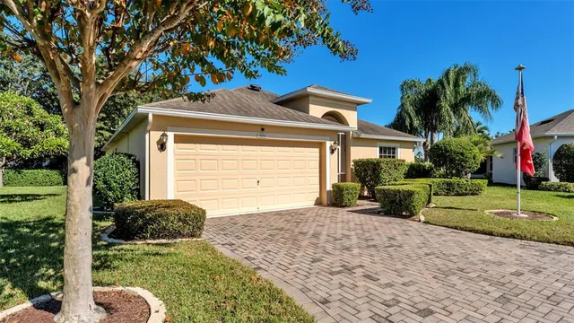 a view of a flowers in front of a house