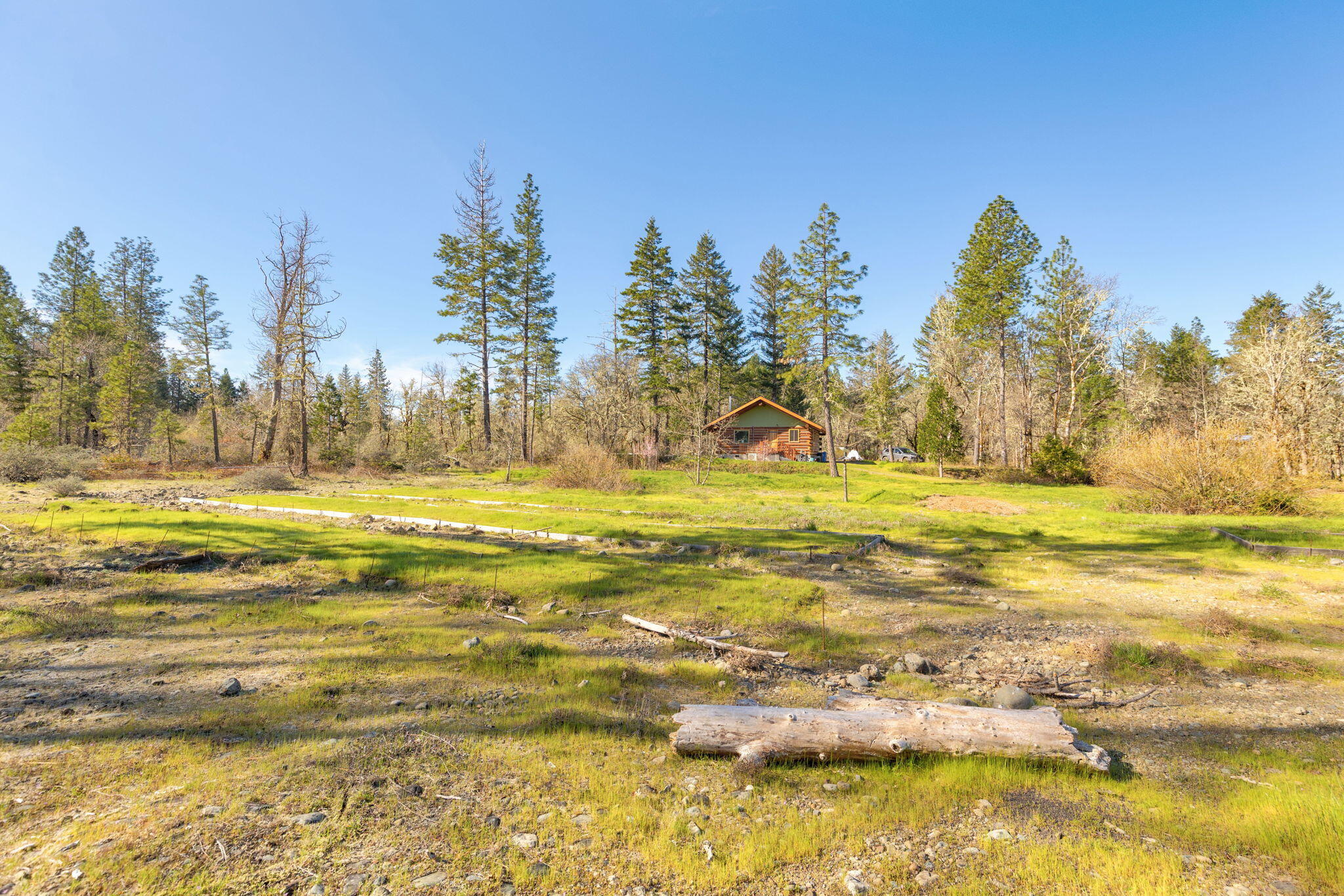 5737 Rockydale Road Cave Junction, OR 97523 - Photo 18 of 39 a view of a swimming pool with an ocean view