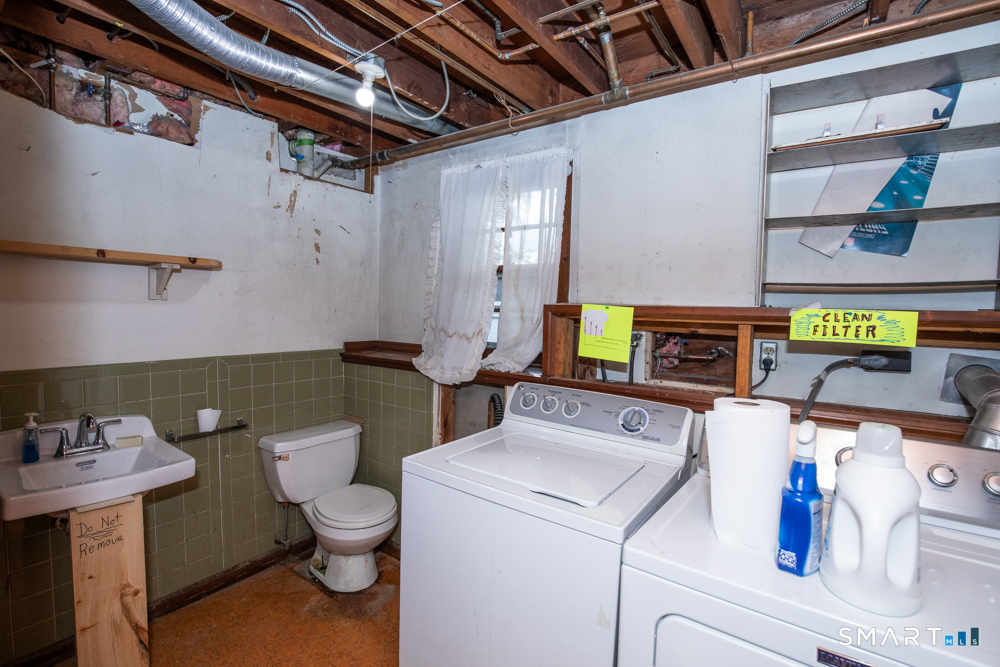 64 Somer Drive Meriden, CT 06451 - Photo 25 of 28 a utility room with dryer and washer