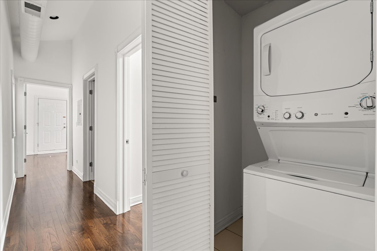821 North Milwaukee Avenue, Unit 3 Chicago, IL 60642 - Photo 15 of 16 a view of bathroom with washer and dryer