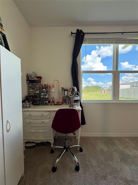 4836 Rigging Street Haines City, FL 33844 - Photo 18 of 29 a workspace with furniture and a window