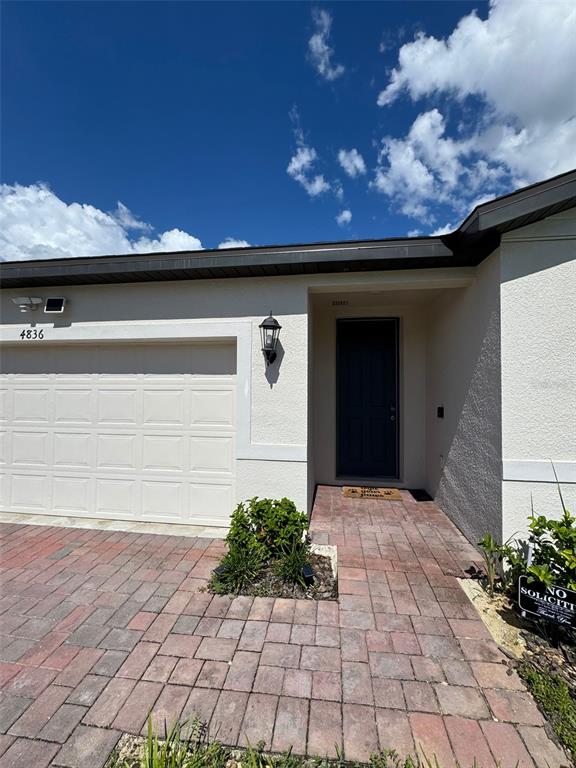 4836 Rigging Street Haines City, FL 33844 - Photo 2 of 29 a front view of a house with a yard
