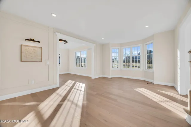 a view of a livingroom with wooden floor