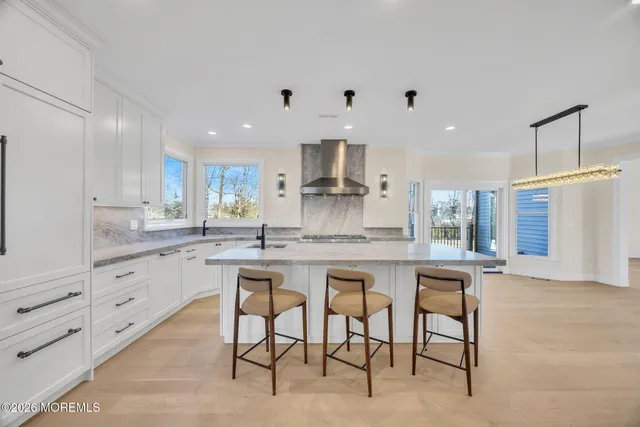 a view of a hallway with a livingroom