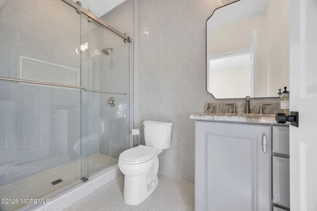 an aerial view of a house with outdoor space