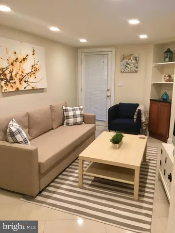 a living room with furniture and a couch