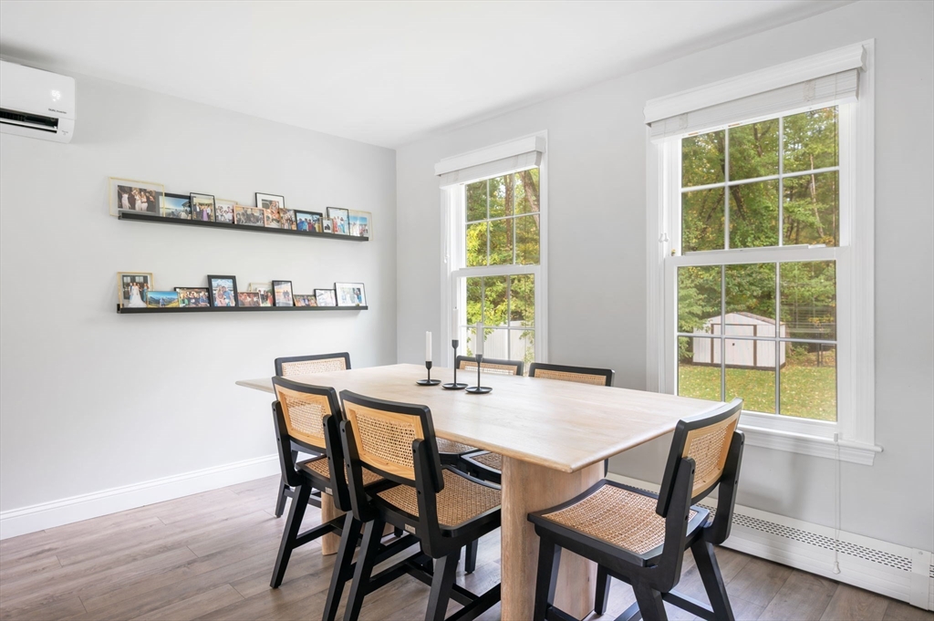 99 Doane Street Cohasset, MA 02025 - Photo 16 of 36 a view of a dining room with furniture and window