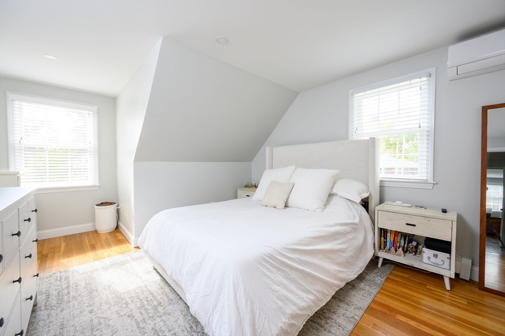 99 Doane Street Cohasset, MA 02025 - Photo 19 of 36 a bedroom with a bed and a window