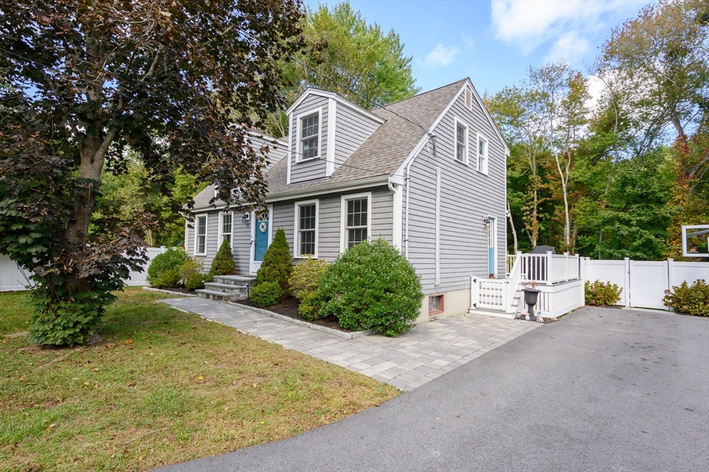 99 Doane Street Cohasset, MA 02025 - Photo 2 of 36 a view of a house with backyard and sitting area