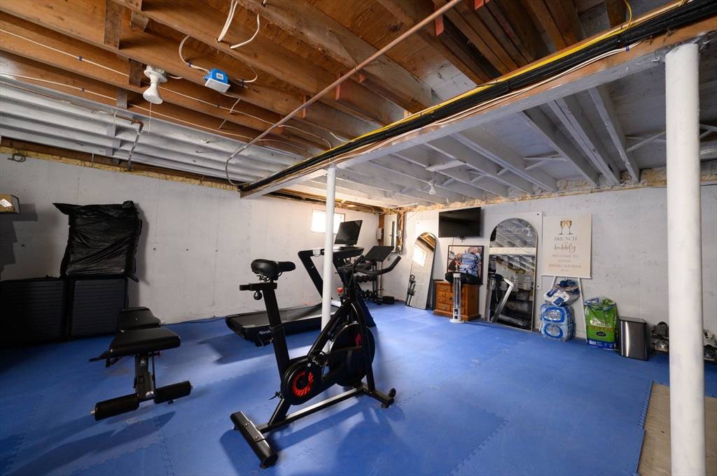 99 Doane Street Cohasset, MA 02025 - Photo 26 of 36 a view of a room with gym equipment