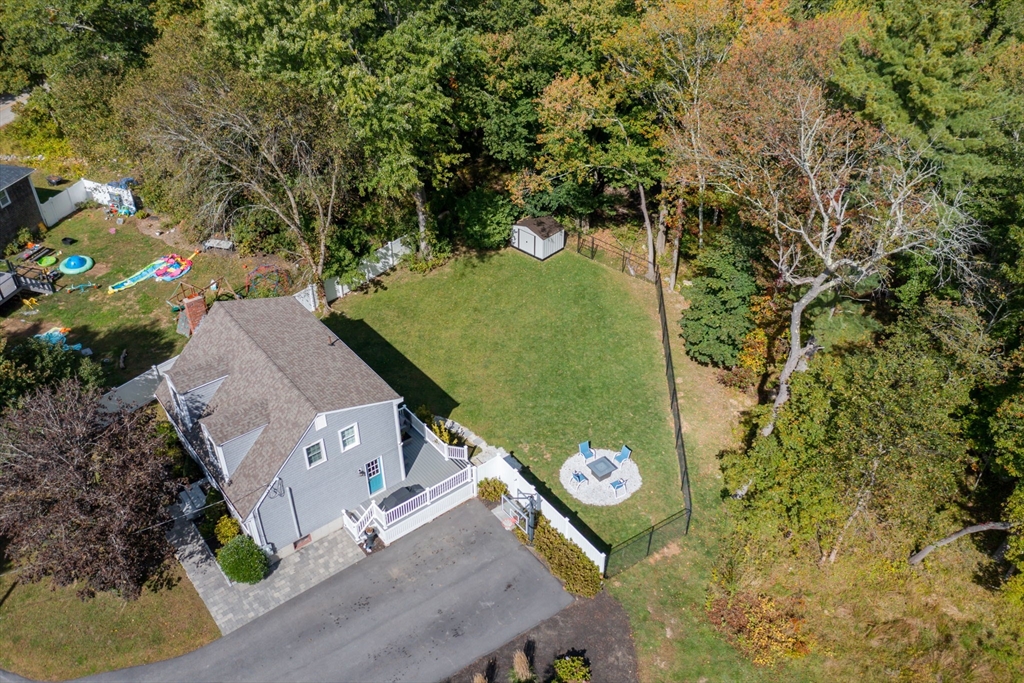99 Doane Street Cohasset, MA 02025 - Photo 36 of 36 an aerial view of a house with a yard