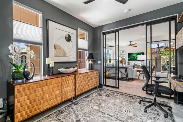 a view of an entryway with wooden floor
