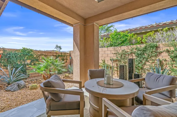 a outdoor living space with furniture and outdoor view
