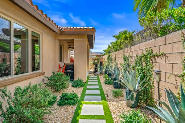 a outdoor space with lots of tables and chairs