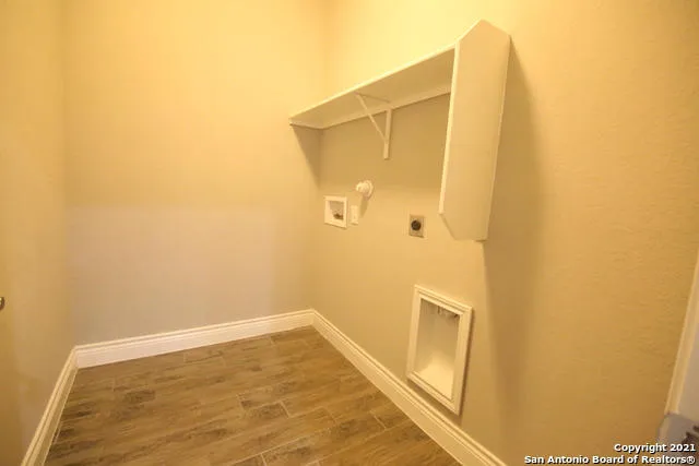 a outdoor living space with furniture and a fireplace