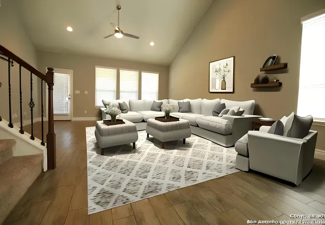 a view of kitchen with furniture and wooden floor