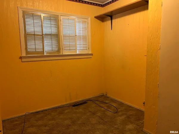 a view of a small space with a window
