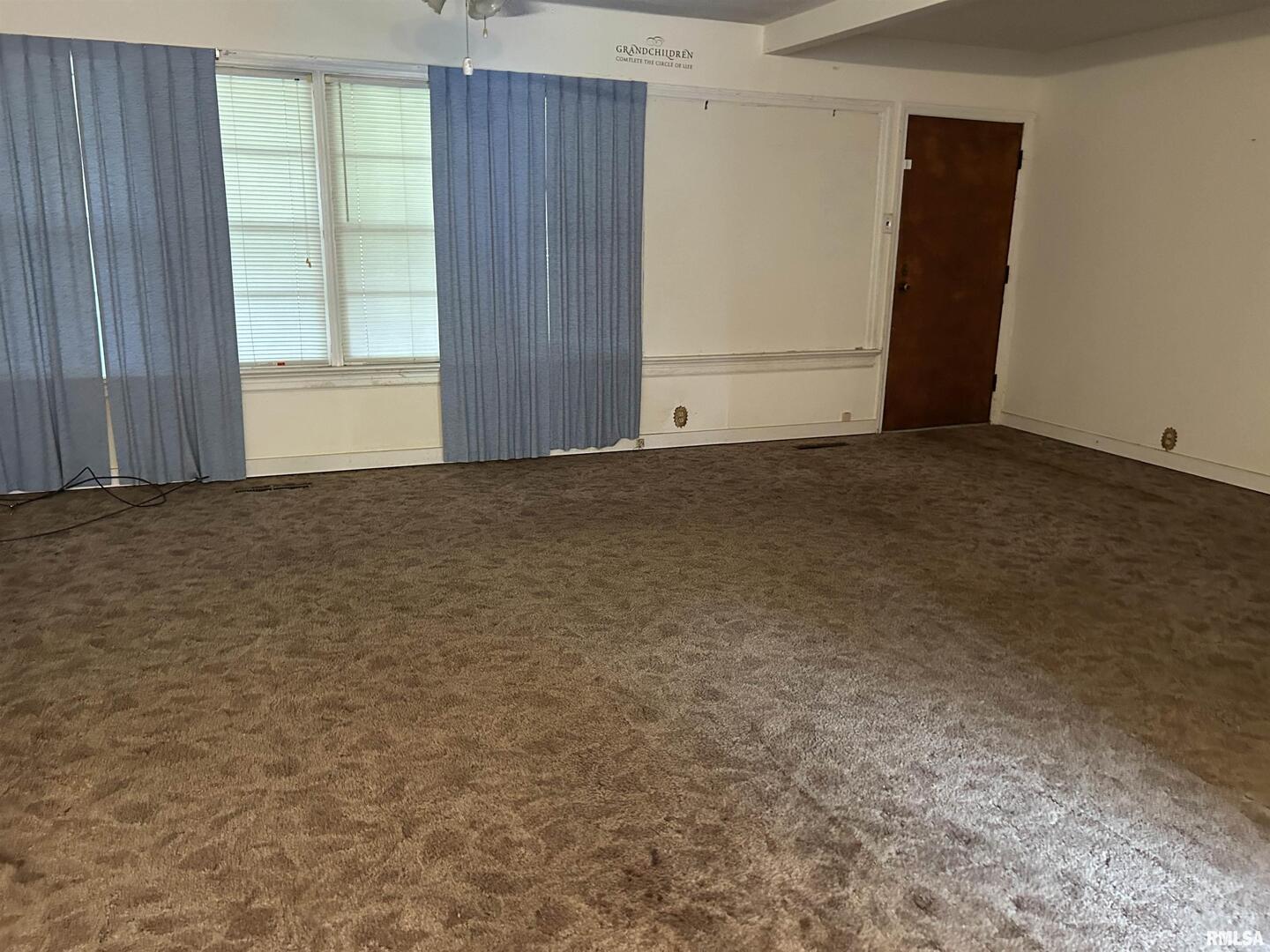 422 West 5th Street Benton, IL 62812 - Photo 7 of 17 an empty room with windows