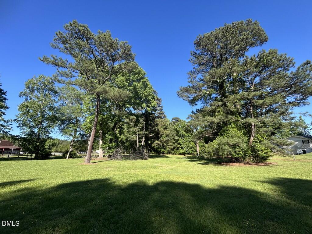 5101 Olde South Road Raleigh, NC 27606 - Photo 1 of 3 a view of a green field