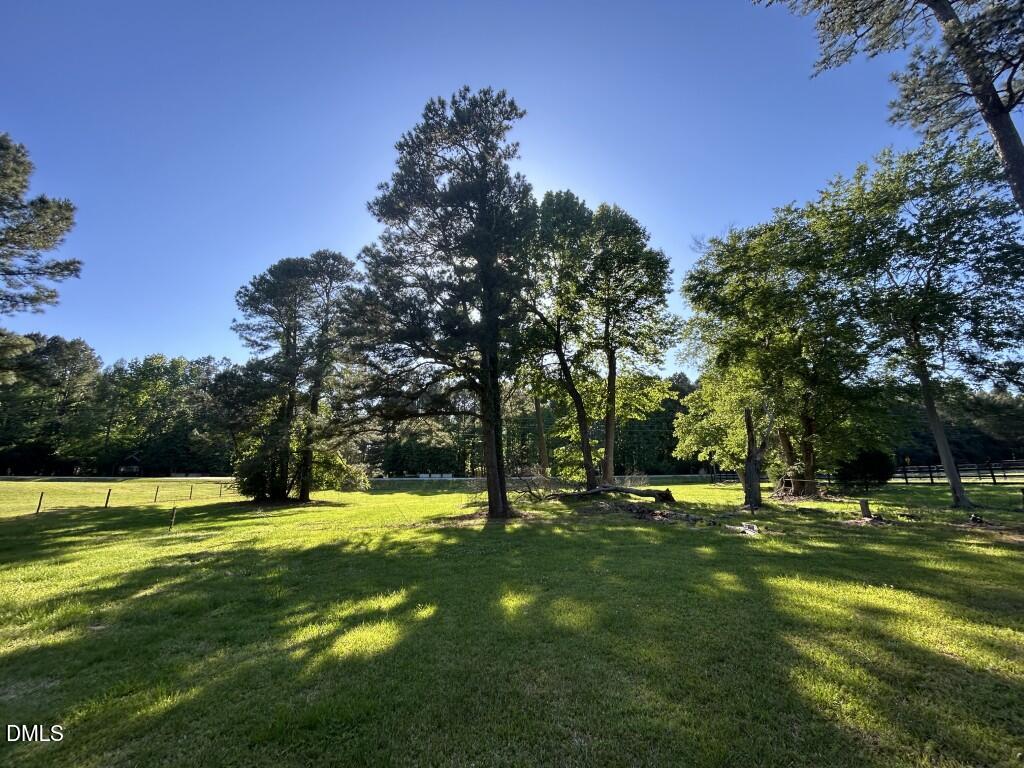 5101 Olde South Road Raleigh, NC 27606 - Photo 2 of 3 a view of a park with large trees