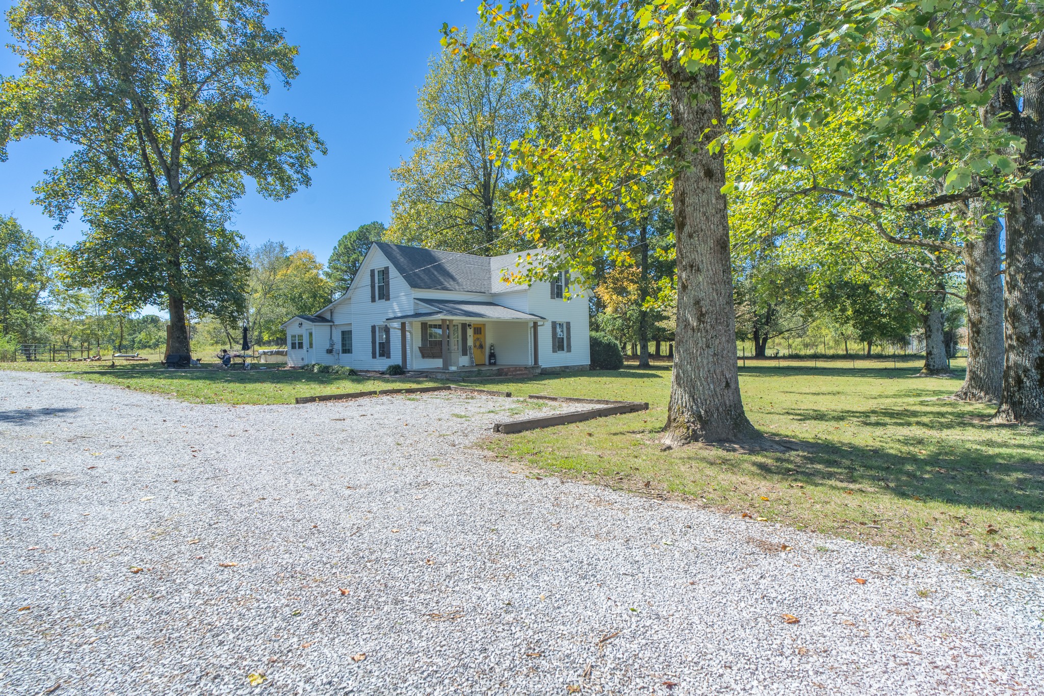 a house with trees in front of it