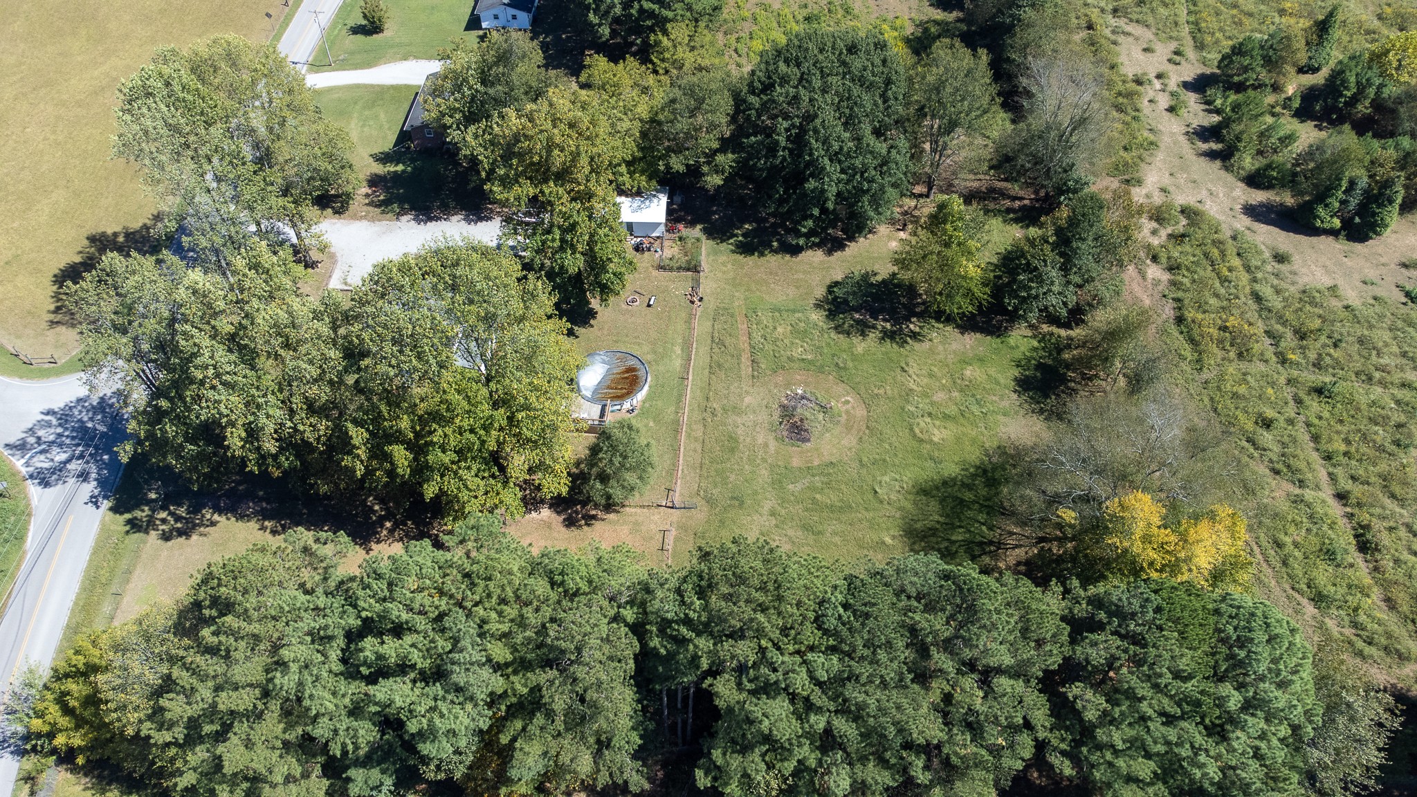 3411 Gimlet Road Lawrenceburg, TN 38464 - Photo 30 of 32 an aerial view of a house with a yard and lake view