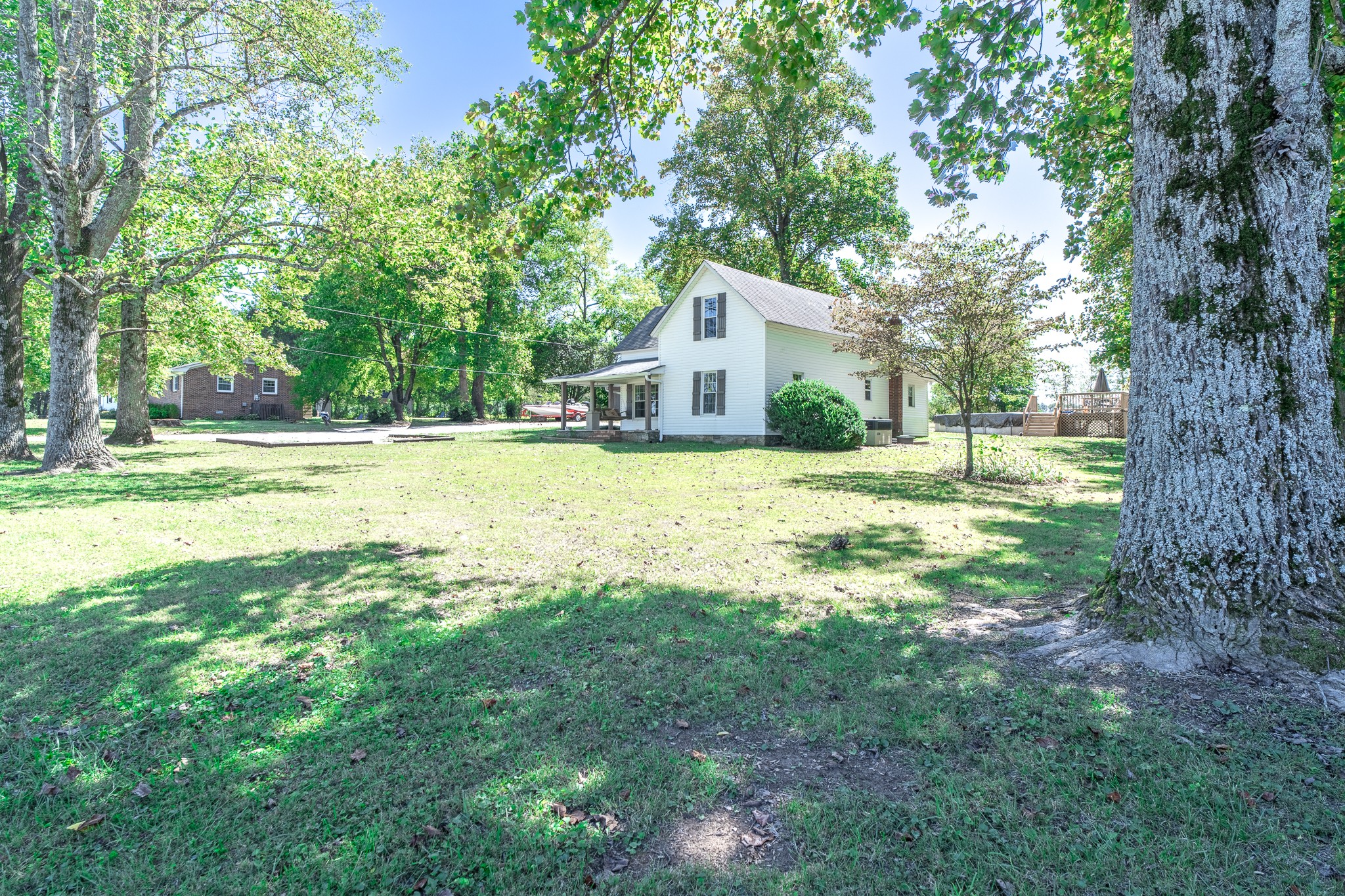 3411 Gimlet Road Lawrenceburg, TN 38464 - Photo 3 of 32 a view of a house with a yard and large trees