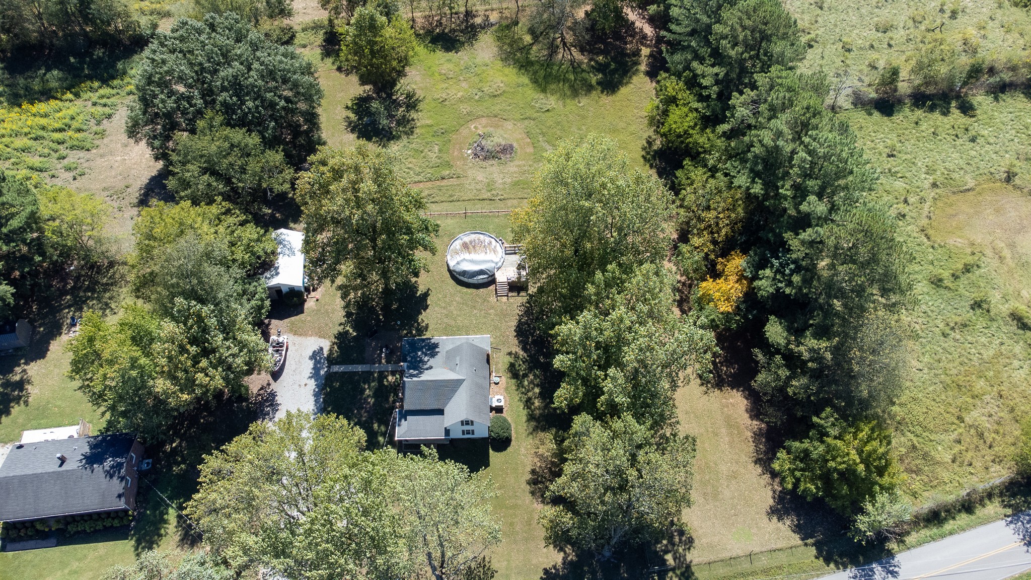 3411 Gimlet Road Lawrenceburg, TN 38464 - Photo 6 of 32 an aerial view of a house with a yard and garden