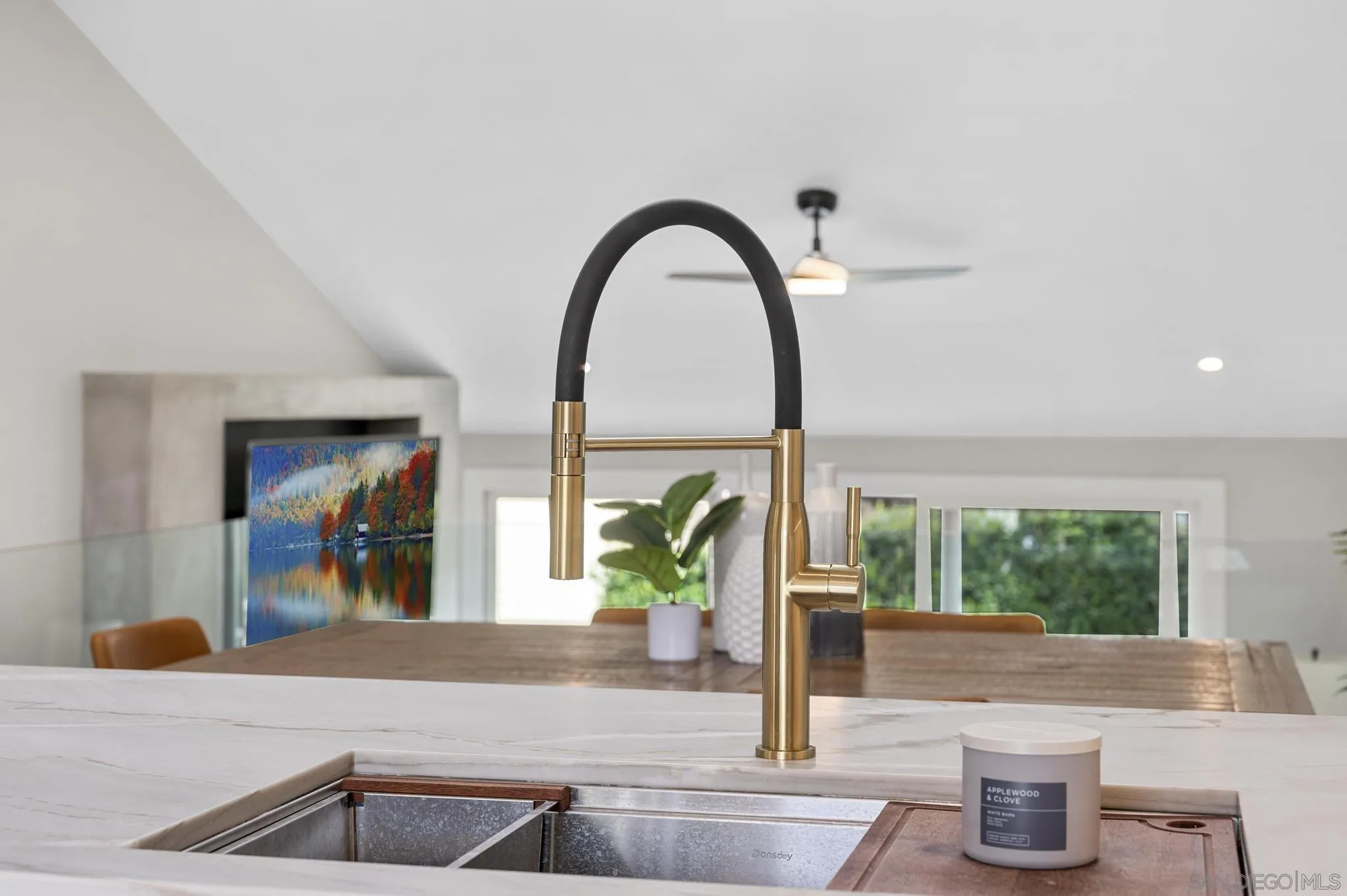 1735 Aldersgate Road Encinitas, CA 92024 - Photo 20 of 49 a kitchen with a sink and a large window