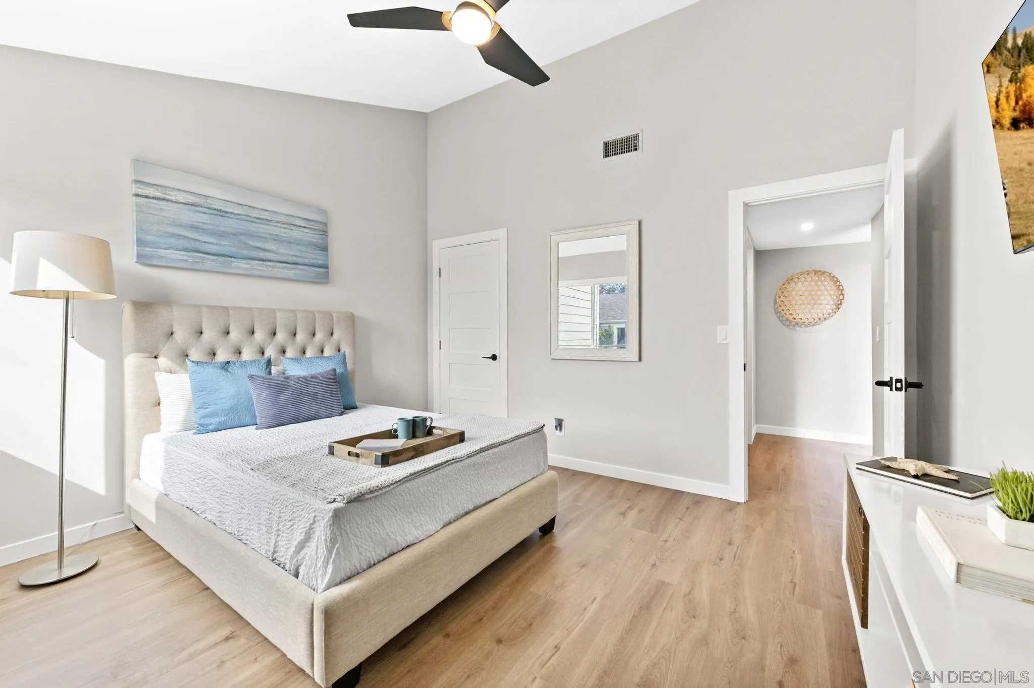 1735 Aldersgate Road Encinitas, CA 92024 - Photo 30 of 49 a bedroom with a bed and a table