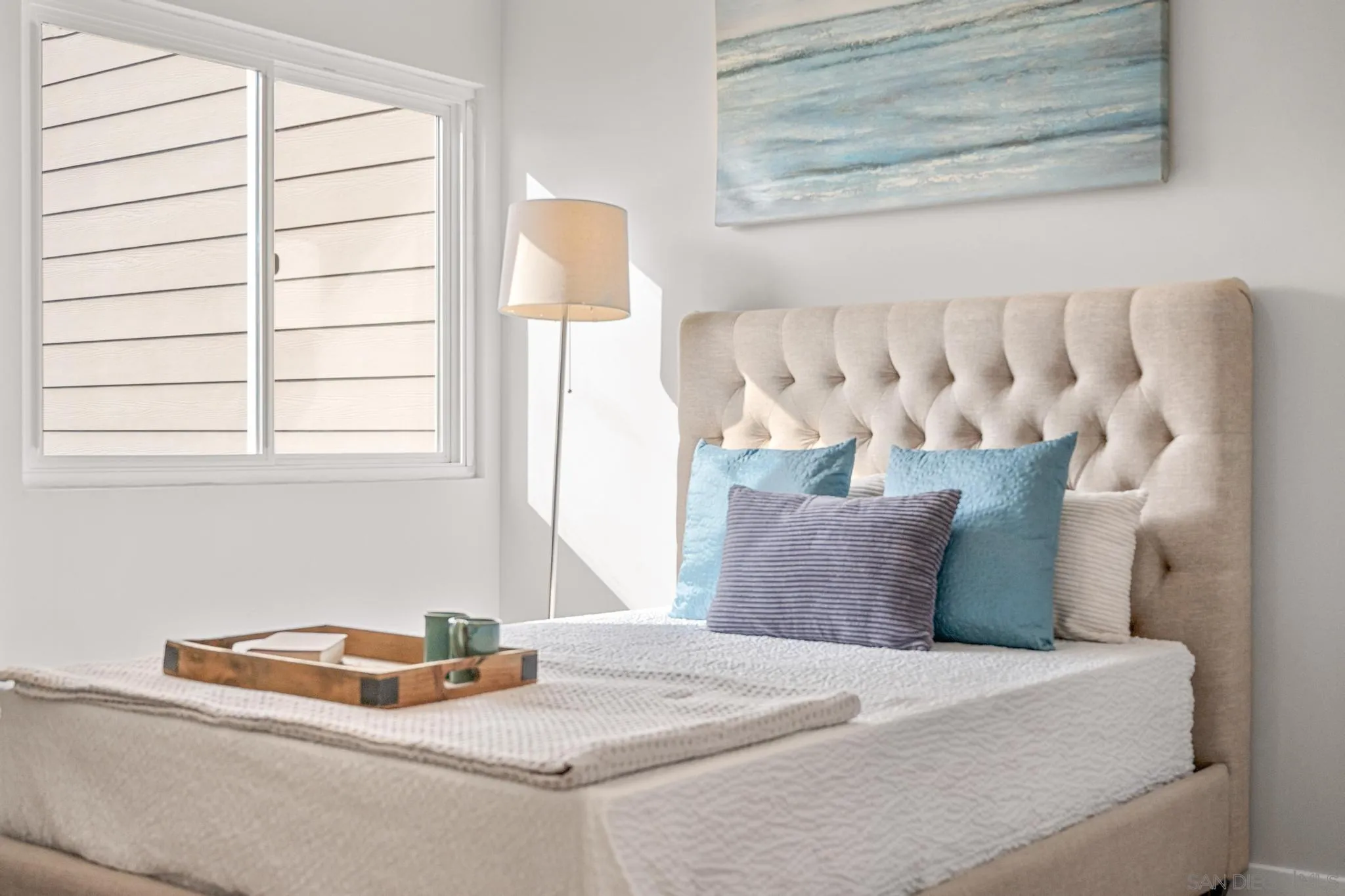 1735 Aldersgate Road Encinitas, CA 92024 - Photo 31 of 49 a bedroom with a bed and window