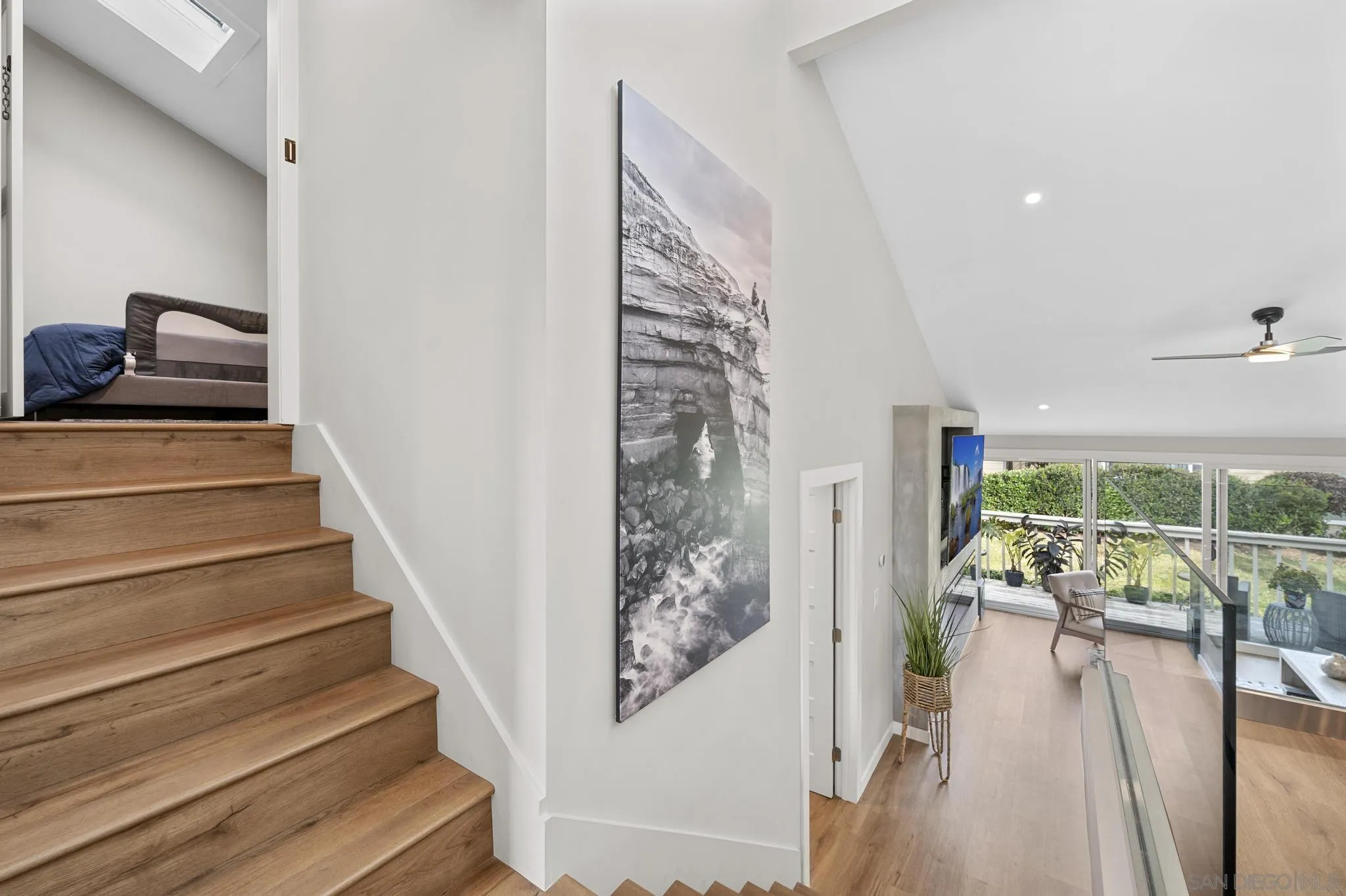 1735 Aldersgate Road Encinitas, CA 92024 - Photo 32 of 49 a view of entryway and hall with wooden floor