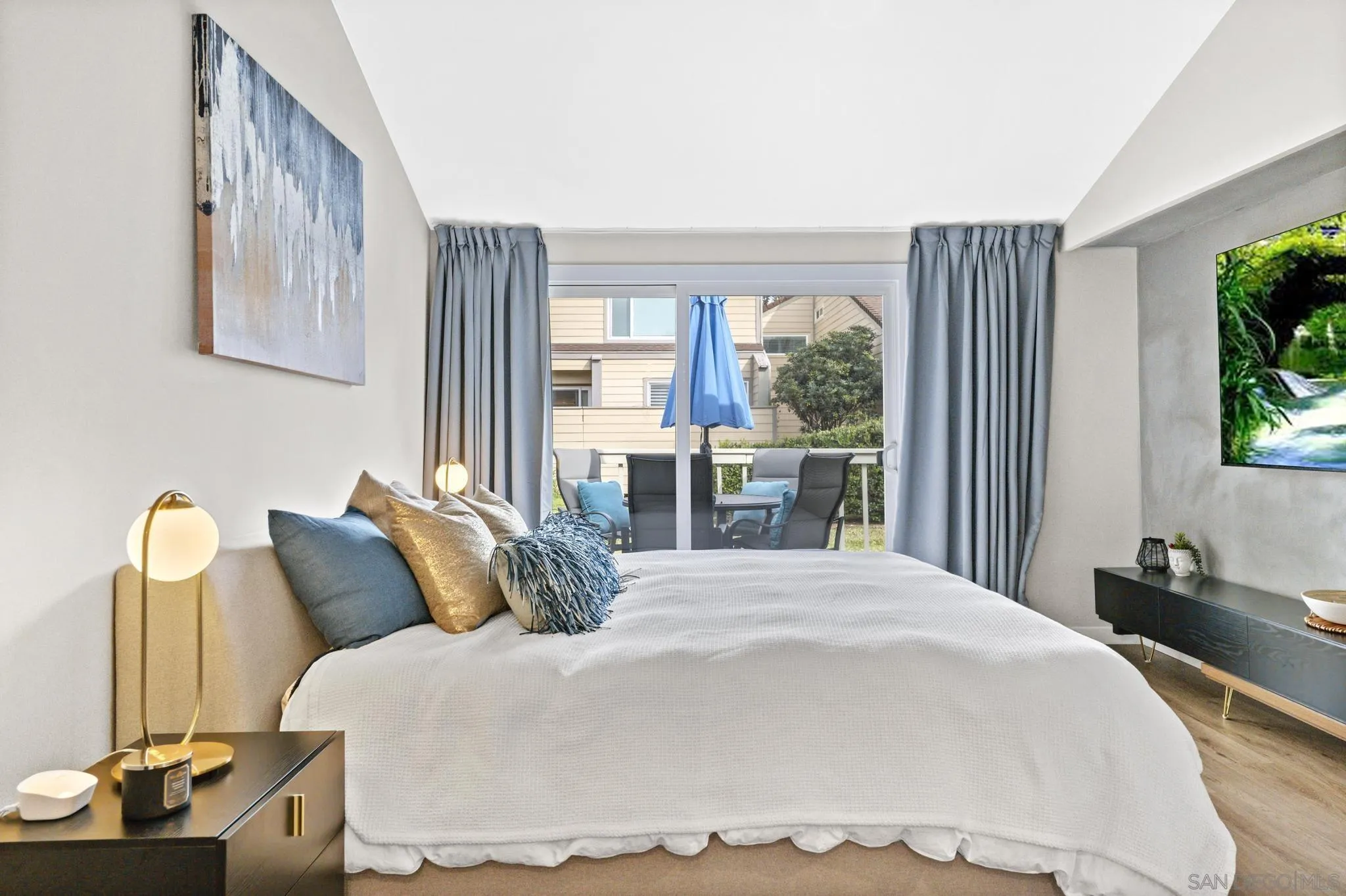 1735 Aldersgate Road Encinitas, CA 92024 - Photo 36 of 49 a bedroom with a bed and a window