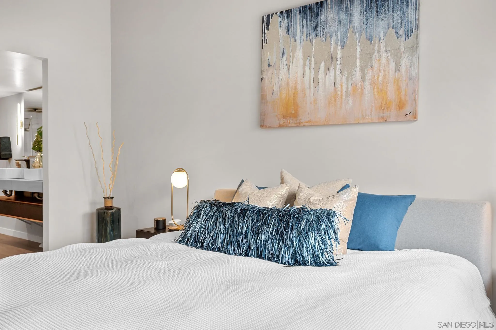 1735 Aldersgate Road Encinitas, CA 92024 - Photo 40 of 49 a bedroom with a bed and a cabinets