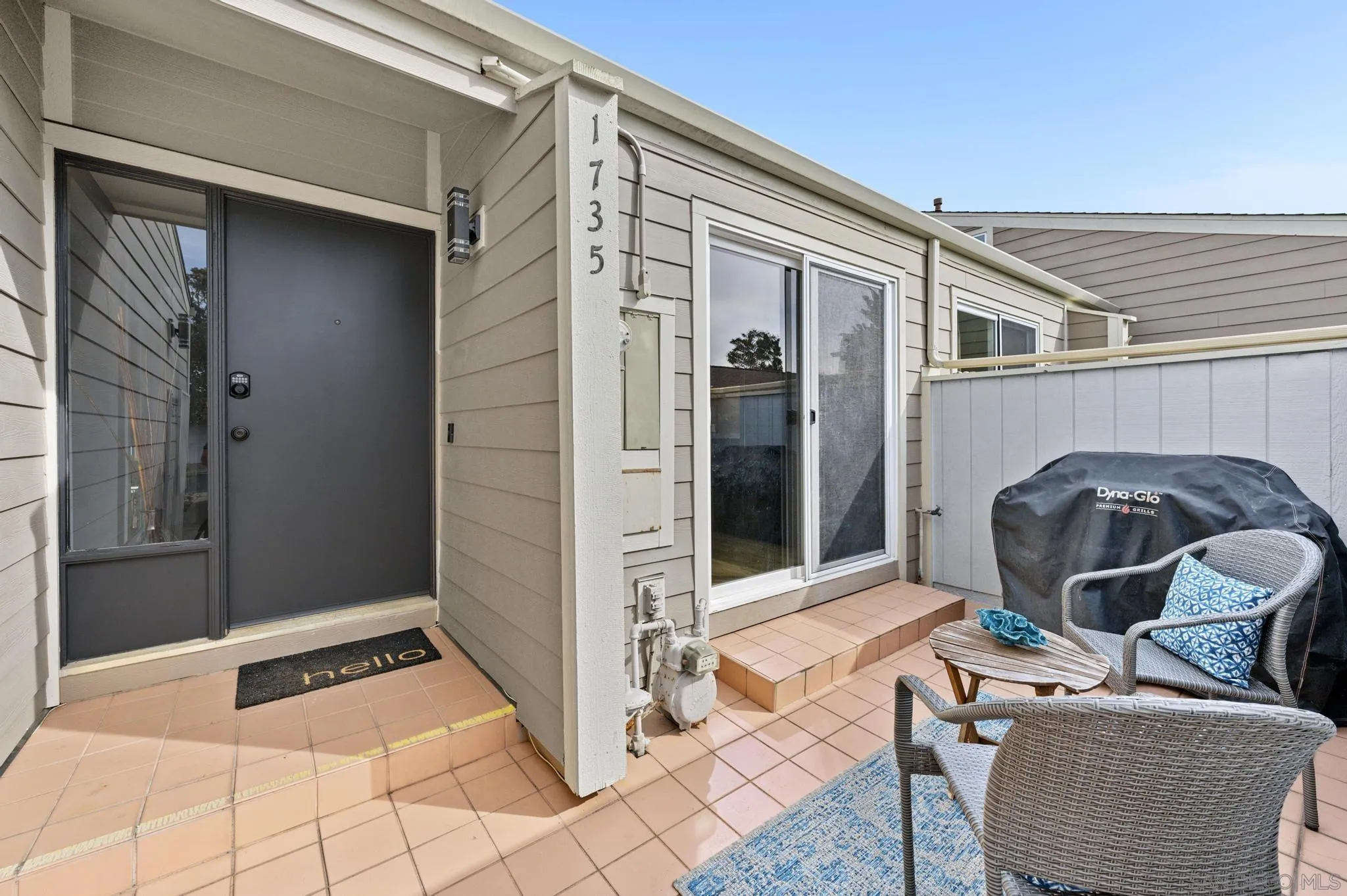 1735 Aldersgate Road Encinitas, CA 92024 - Photo 6 of 49 a backyard of a house with seating space