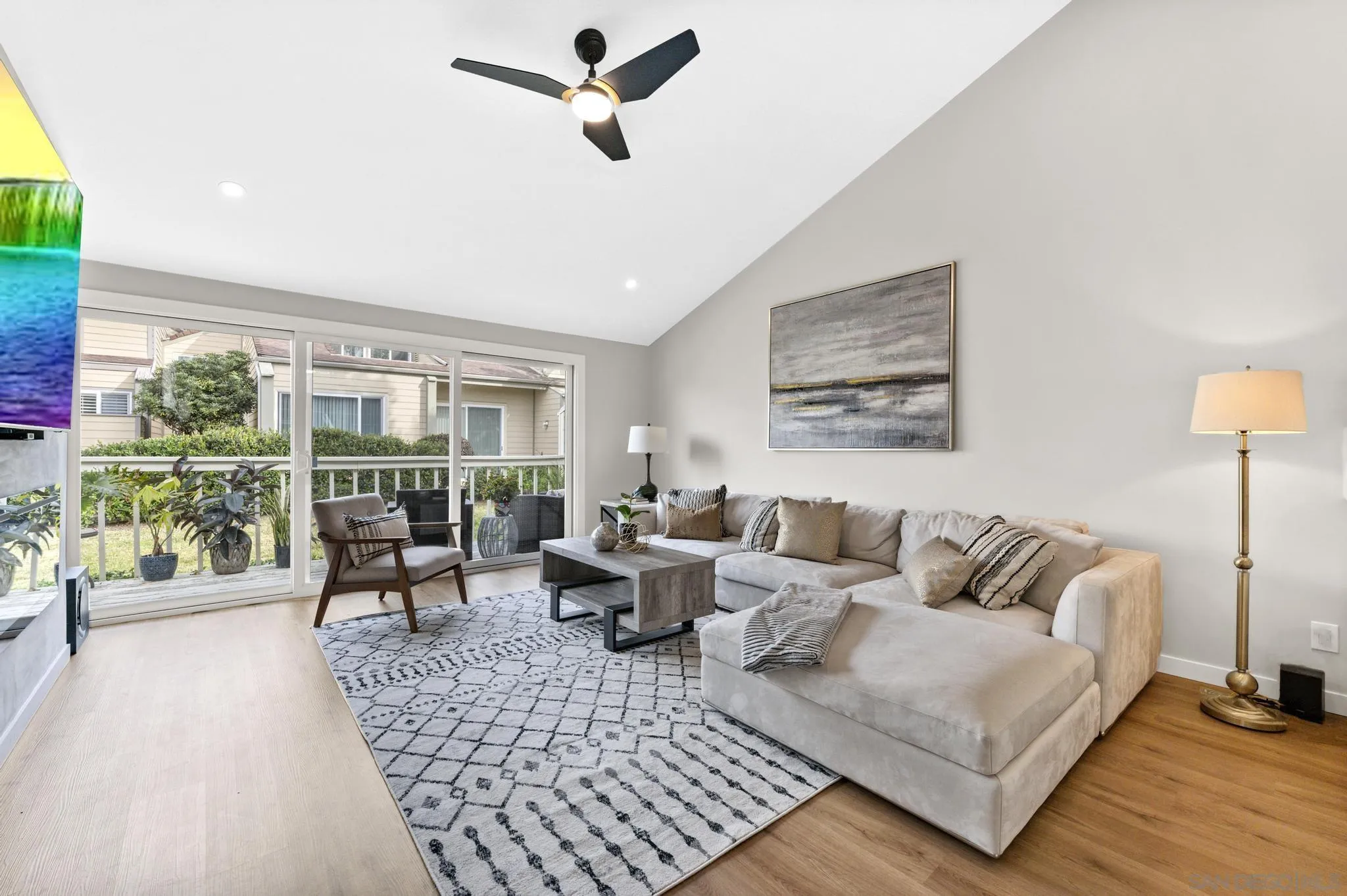 1735 Aldersgate Road Encinitas, CA 92024 - Photo 8 of 49 a living room with furniture and a large window
