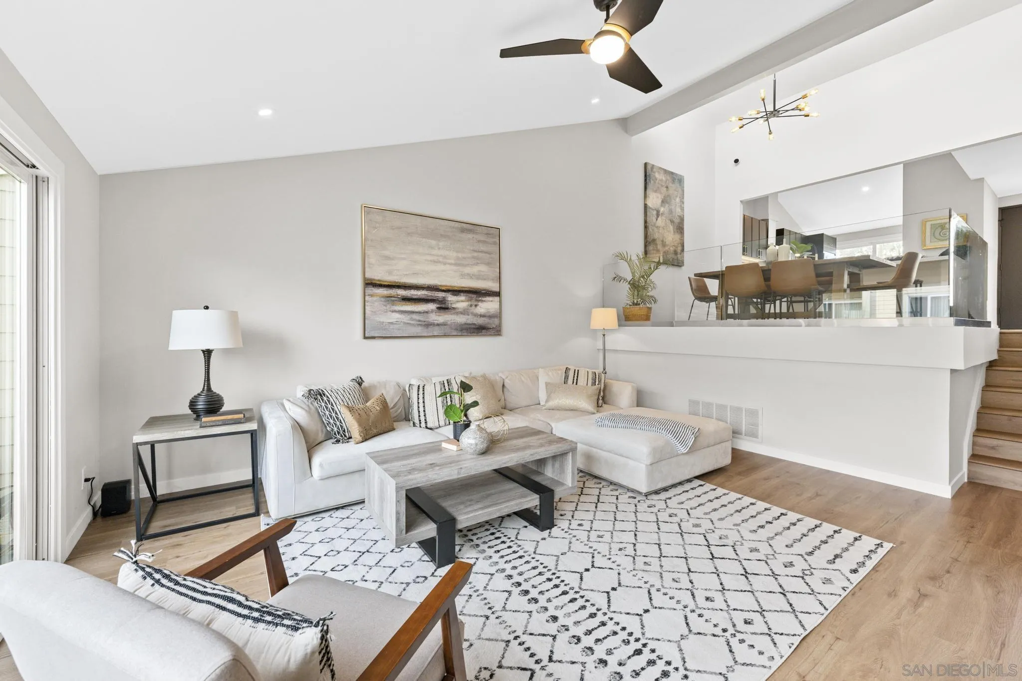 1735 Aldersgate Road Encinitas, CA 92024 - Photo 10 of 49 a living room with furniture and wooden floor