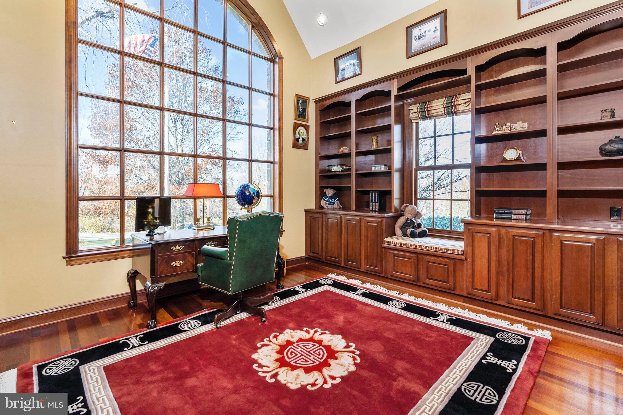 112 St Moritz Drive Wilmington, DE 19807 - Photo 12 of 59 Two story library with built-ins.