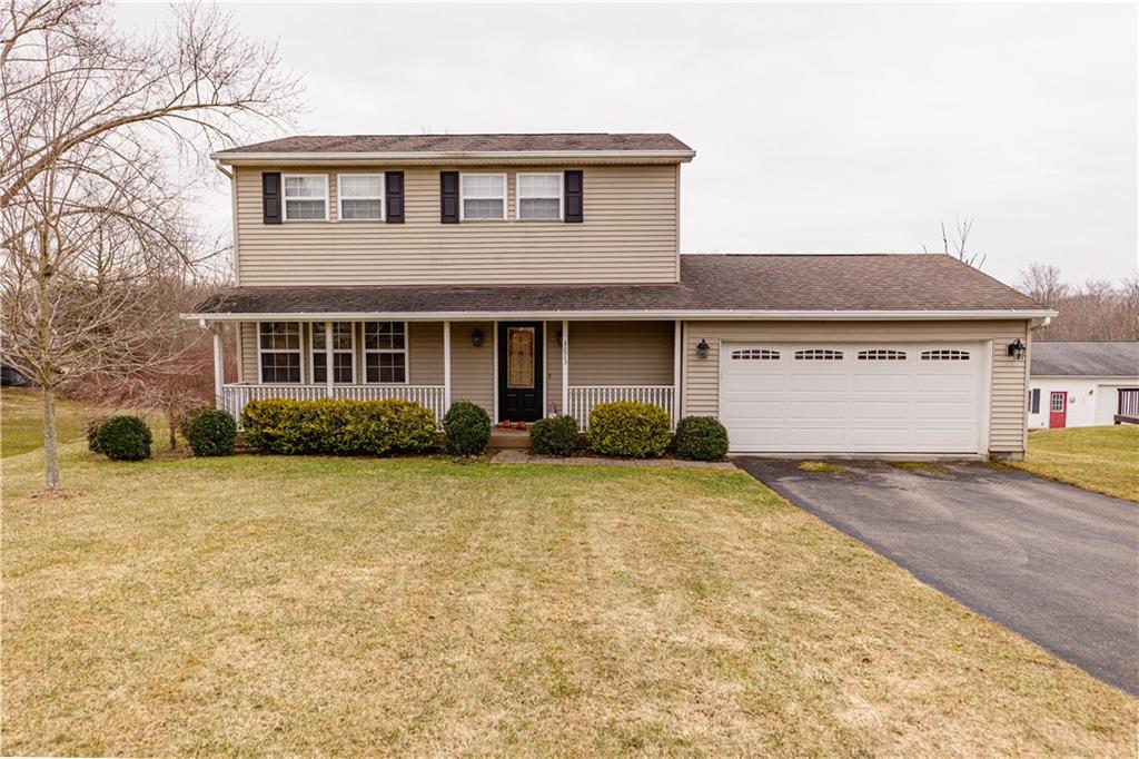3673 Mitchell Road New Castle, PA 16105 - Photo 1 of 25 a front view of a house with a yard