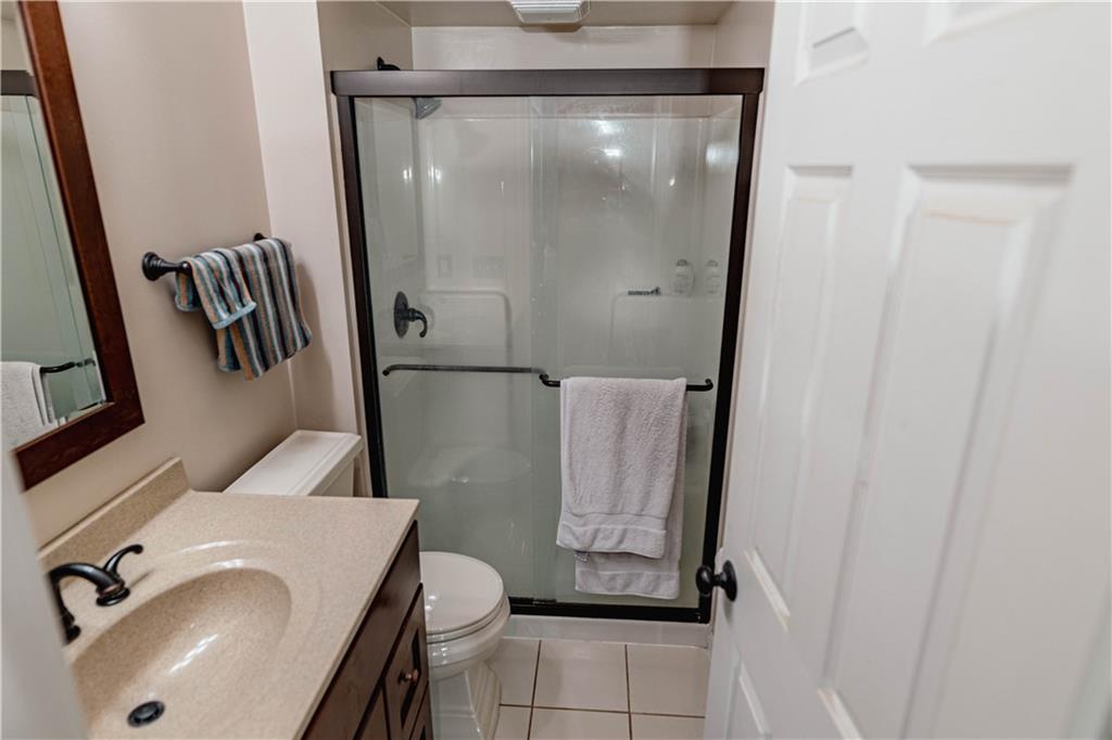 3673 Mitchell Road New Castle, PA 16105 - Photo 13 of 25 a bathroom with a sink and mirror
