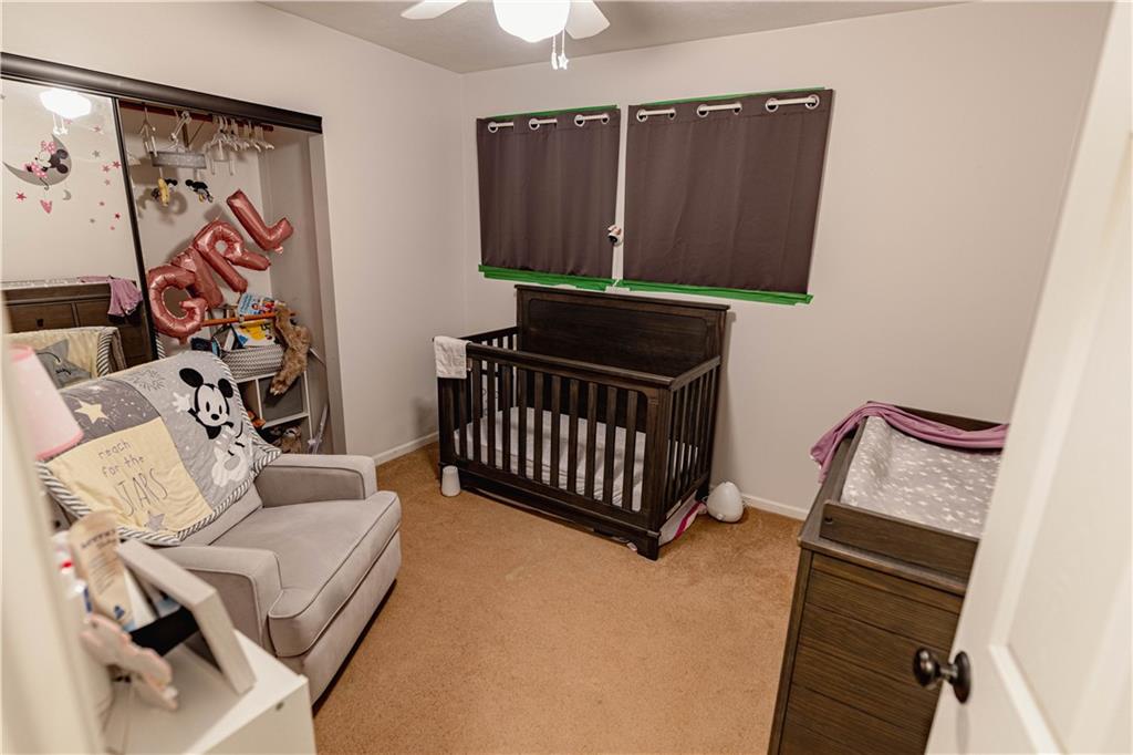 3673 Mitchell Road New Castle, PA 16105 - Photo 16 of 25 a living room with furniture and a window
