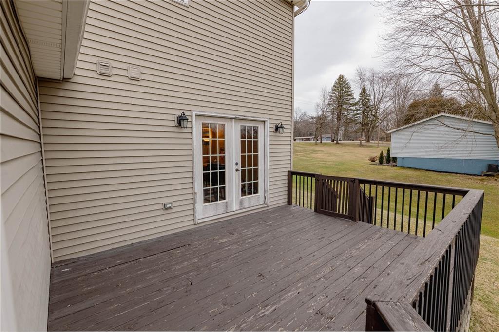 3673 Mitchell Road New Castle, PA 16105 - Photo 18 of 25 a view of a house with wooden deck